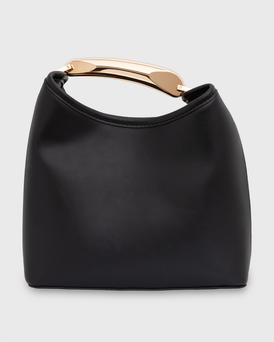 Black handbag with a smooth texture and a sleek gold handle. Simple and elegant design.